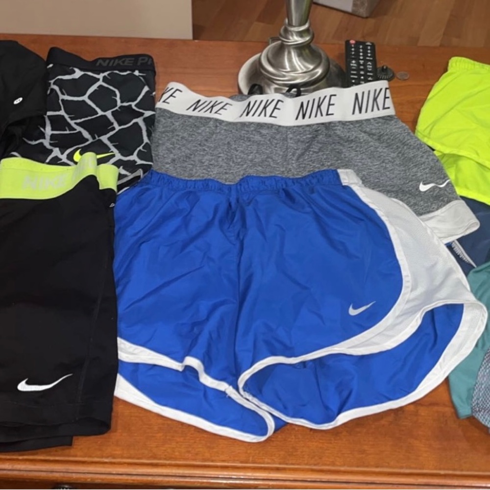 10 pairs of women’s athletic shorts mixed lot size smalls and mediums.